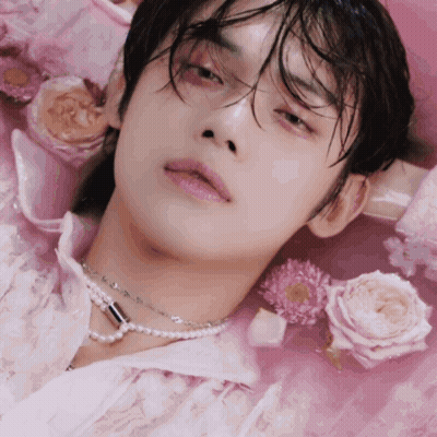 Person Laying On Pink Surface GIF