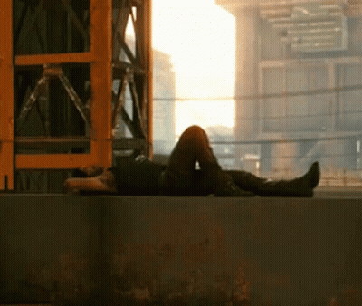 Person Laying On Wall With Feet Crossed GIF