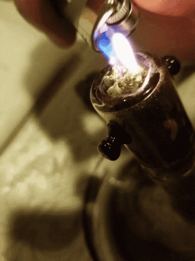 Person Lighting A Lighter GIF
