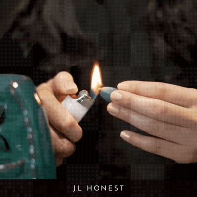 Person Lighting Lighter With Jl Honest GIF