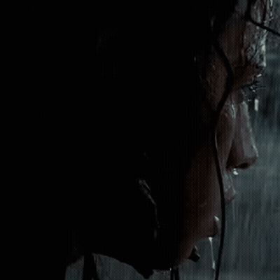 Person Looking Out Window At Beach With Boats GIF