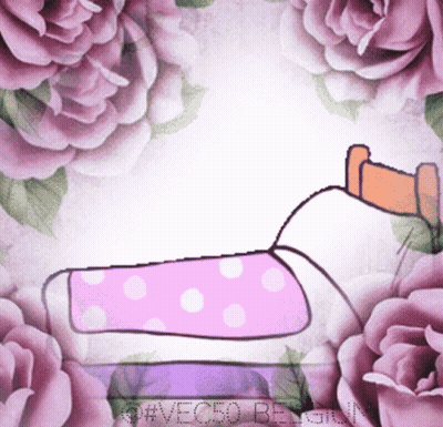 Person Lying On Bed Surrounded By Roses GIF