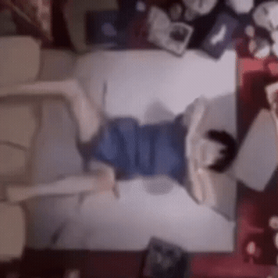 Person Lying On Bed With Crossed Legs GIF