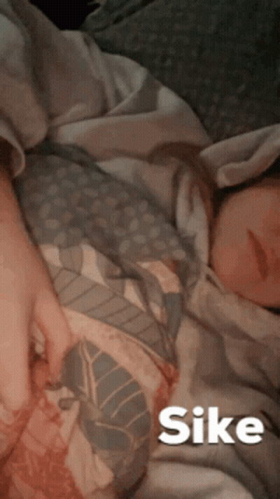 Person Lying on Bed with Sike