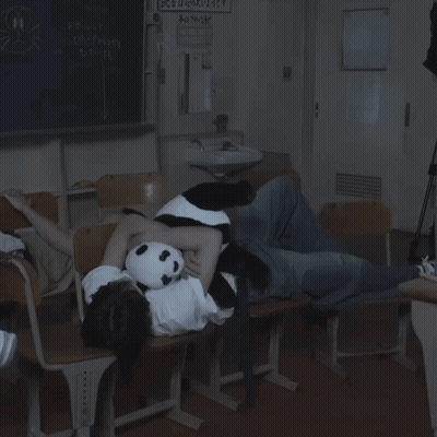 Person Lying On Chair With Panda Stuffed Animal GIF