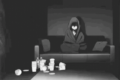 Person Lying On Couch In Dark Room GIF