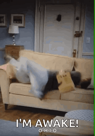 Person Lying On Couch Saying Im Awake GIF