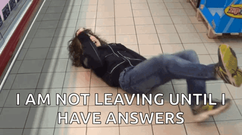 Person Lying On Floor Saying I Am Not Leaving Until I Have Answers GIF