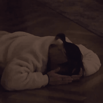 Person Lying On Floor With Towel GIF