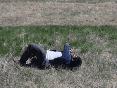 Person Lying On Grass GIF