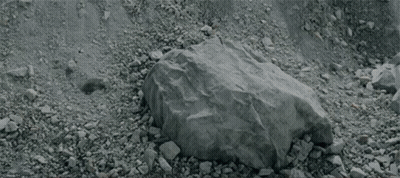 Person Lying On Ground With Blanket On Head GIF