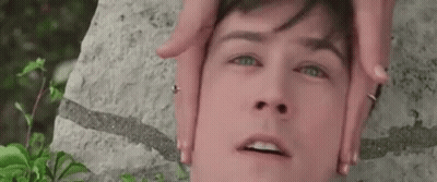 Person Making Face With Hands GIF