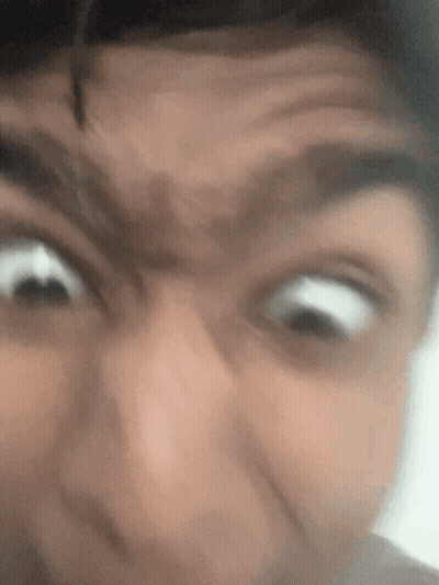 Person Making Funny Face With Eyes Wide Open GIF
