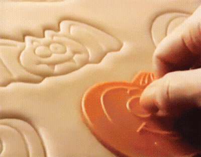 Person Making Heart With Cookie Cutter GIF