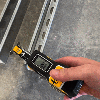 Person Measuring Metal With Tape Measure 2.0 Inches GIF