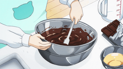 Person Mixing Chocolate In Metal Bowl GIF