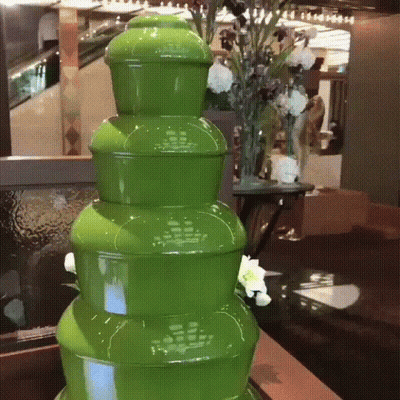 Person Mixing Green Liquid GIF