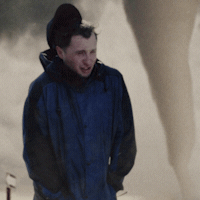 Person On Black And Yellow Striped Background GIF
