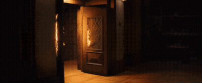 Person On Fire In Doorway GIF
