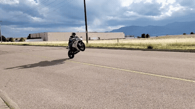 Person On Kawasaki Motorcycle Doing Trick GIF