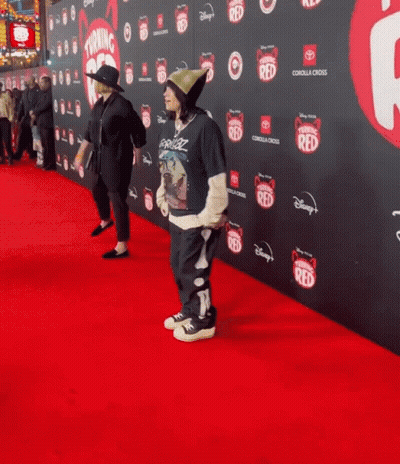 Person On Red Carpet With Disney Logo GIF
