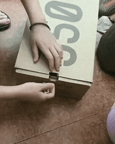 Person Opening Box With ACG GIF