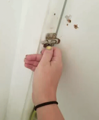 Person Opening Door With Key GIF