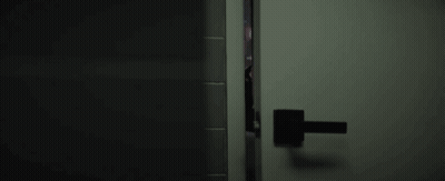 Person Peeking Through Door GIF