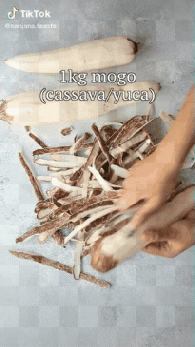 Person Peeling Cassava And Yuca GIF