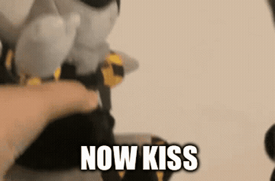Person Petting Stuffed Animal Saying Now Kiss GIF