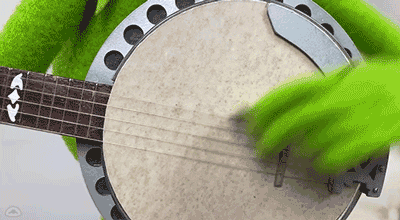Person Playing Banjo With Green Glove GIF