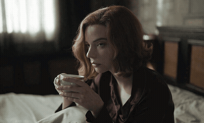 Person Playing Chess With Netflix Logo GIF