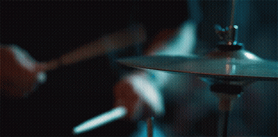 Person Playing Cymbal With Drum Stick GIF