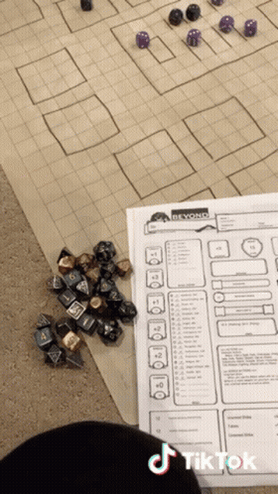 Person Playing Dice With Paper Saying Beyond GIF