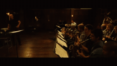 Person Playing Drums With Fender Logo GIF