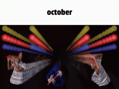 Person Playing Flute With October Above GIF