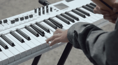 Person Playing Korg Keyboard GIF