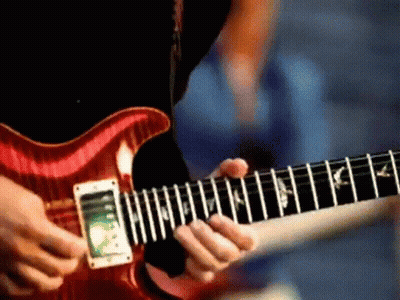 Person Playing Red Electric Guitar GIF
