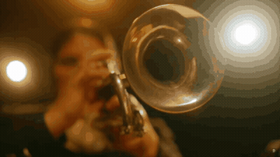 Person Playing Trumpet GIF