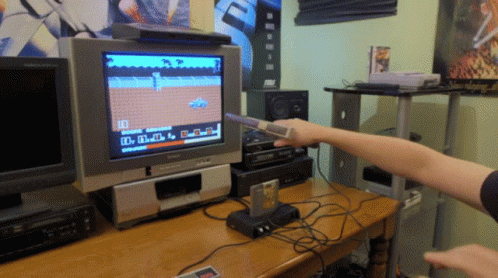 Person Playing Video Game On Panasonic TV GIF