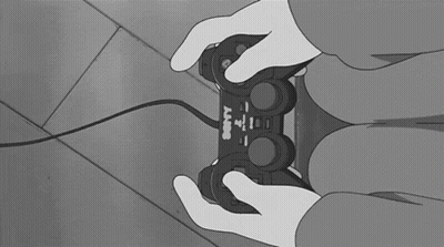 Person Playing Video Game With PlayStation Controller GIF