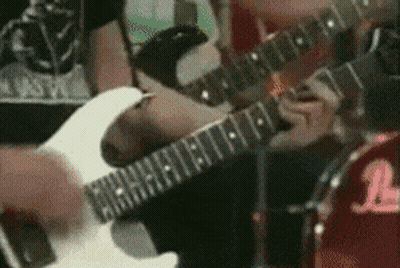 Person Playing White Guitar With L GIF