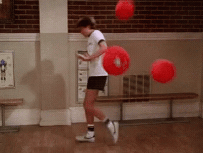 Person Playing With Red Balls