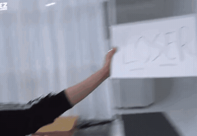 Person Pointing At Exit Sign GIF