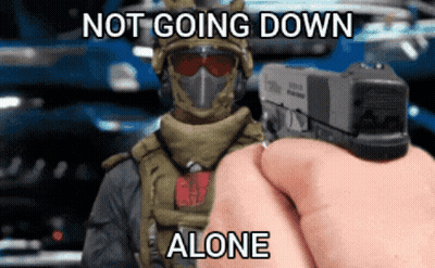 Person Pointing Gun at Soldier Saying Not Going Down Alone