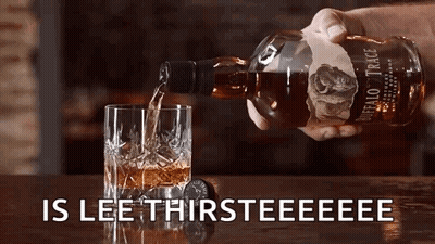 Person Pouring Buffalo Trace Whiskey Into Glass GIF