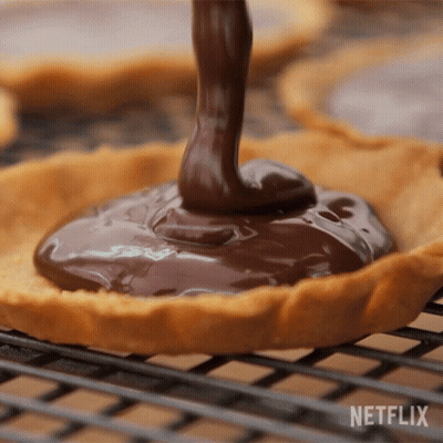 Person Pouring Chocolate Behind Netflix Logo GIF