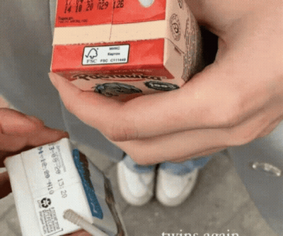 Person Pouring Chocolate Into Cupcake Pan GIF