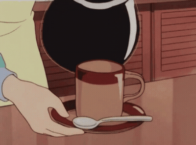 Person Pouring Coffee Into Cup With Spoon GIF