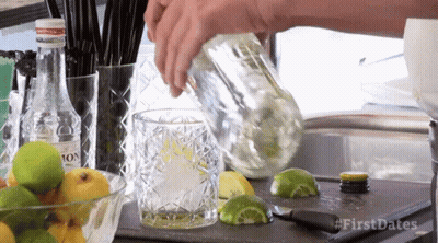 Person Pouring Drink Into Glass With First Dates GIF
